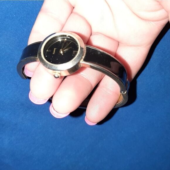 Black and silver hinged bangle watch main image 7